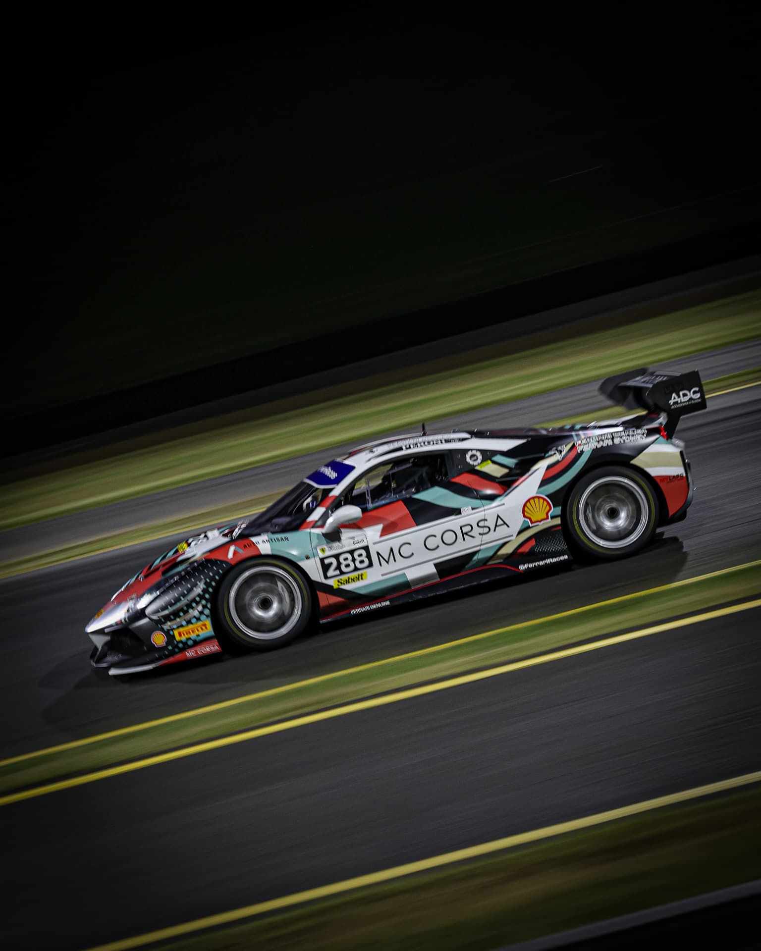 MC Corsa Ferrari #288 panned at speed under lights